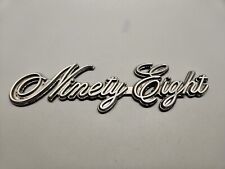 OLDS OLDSMOBILE NINETY EIGHT 98 EMBLEM NAMEPLATE 7 INCH picture