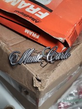 1970 - 1972 Chevrolet Monte Carlo Roof Sail Panel Script Emblem NOS GM 8798374 picture