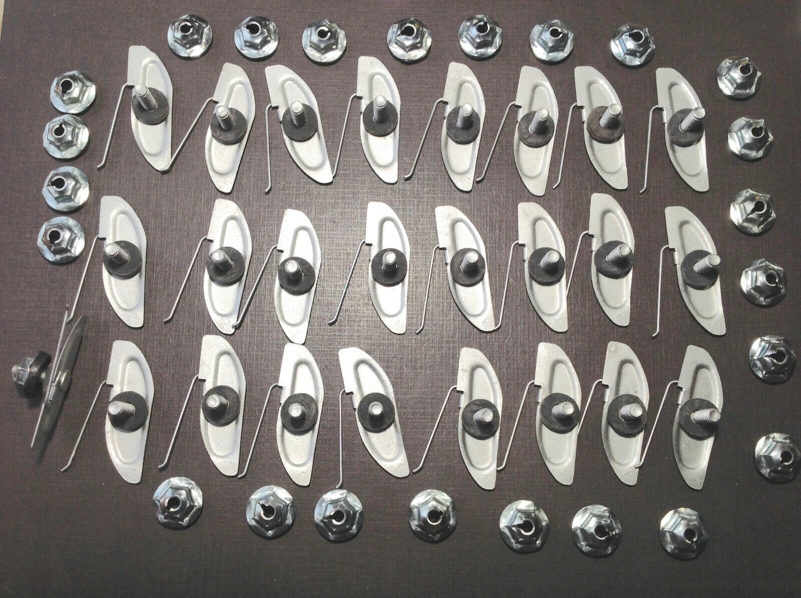 25 NORS fender quarter door moulding clips sealer nuts 1-1/8\