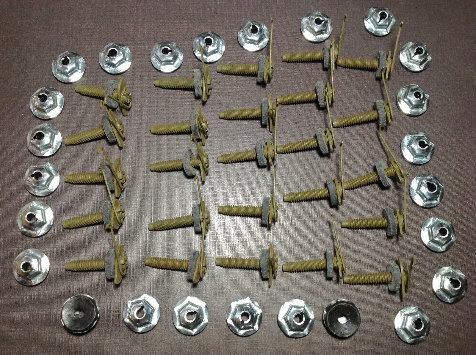 25 NOS fender door hood moulding clips sealer nuts 1/2