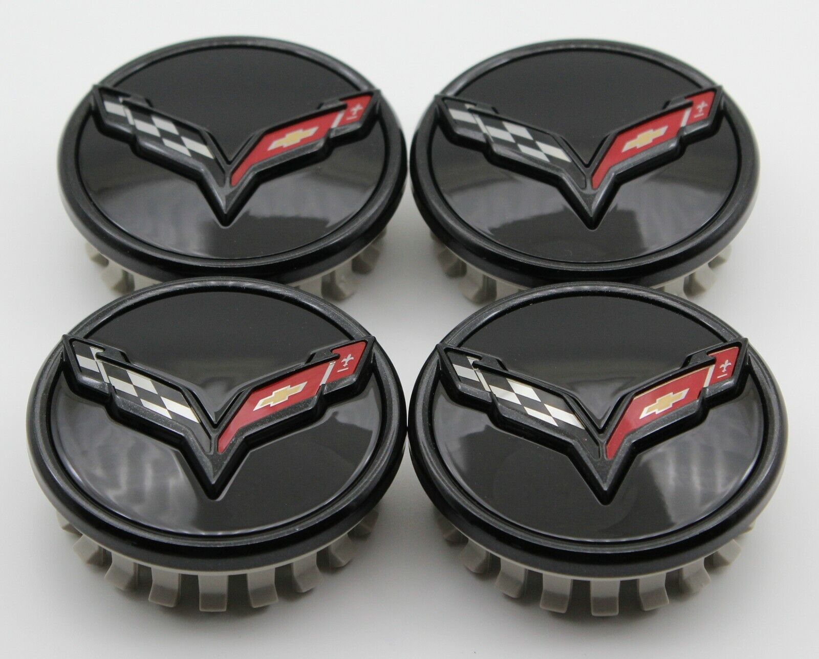 NEW Chevrolet Corvette C7 black center caps factory OEM GM 23217059 - set of 4