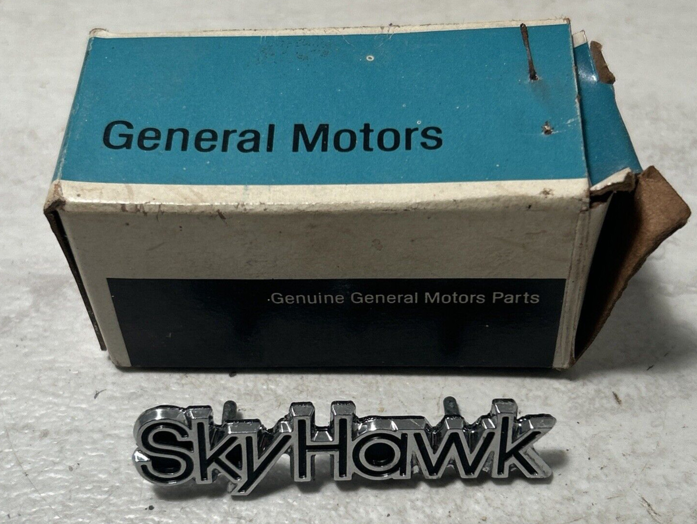 NOS 1982-89 Buick Skyhawk Dash Door Emblem Badge Chrome Color 2.5\