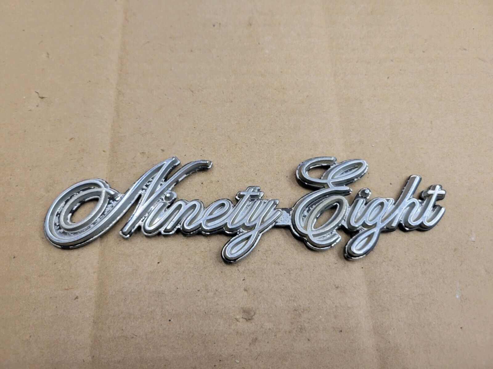 Oldsmobile OEM Ninety Eight 98 Chrome Emblem Badge Logo Nameplate Name Plate